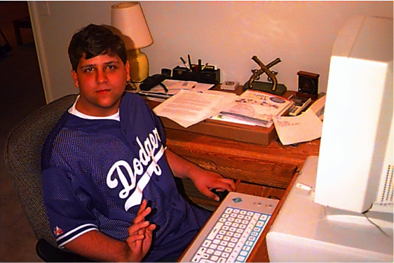 DO-IT Scholar Jeff using IntelliKeys to access his computer in 1998